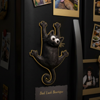 Cat Magnet on Dark Fridge